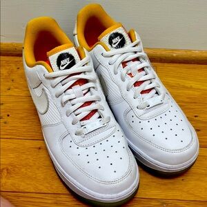 Nike Air Force 1 Lows in white and dark sulfur.  115+ new on StockX.